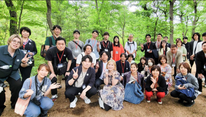 SMG経営塾のイベントでの講師と参加者の集合写真