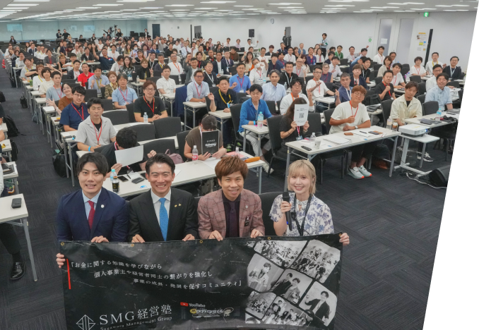 実施された定例会での講師と参加者の集合写真